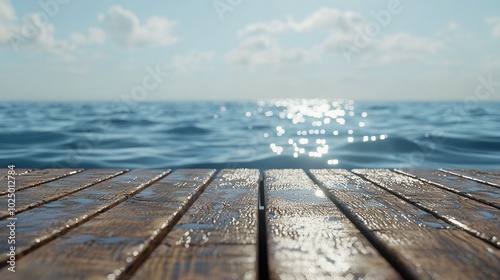   A photo of a wooden table with water in the foreground, surrounded by clouds in the background, and a clear blue sky above