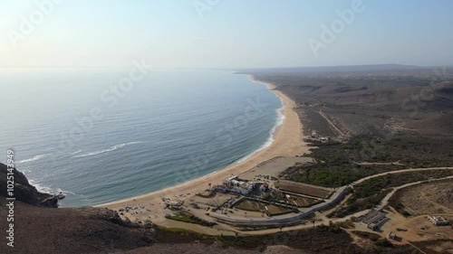 Wallpaper Mural Aerial drone footage of a large white sand beach coastline with ocean waves and nature on a clear summer day Torontodigital.ca