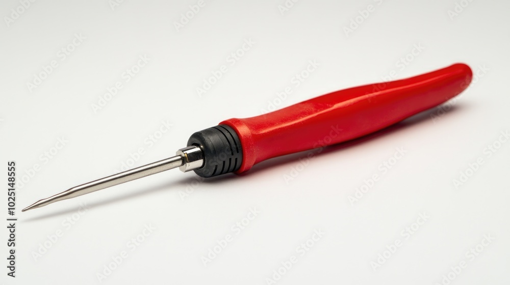 A detailed view of a red tool against a white background A detailed view of a red tool against a white background