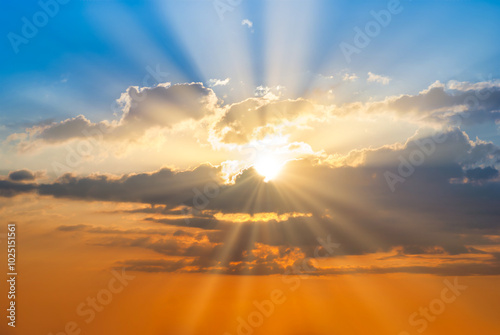Fototapeta Naklejka Na Ścianę i Meble -  Sunset sky clouds with sun rays. Sunset sky landscape for background