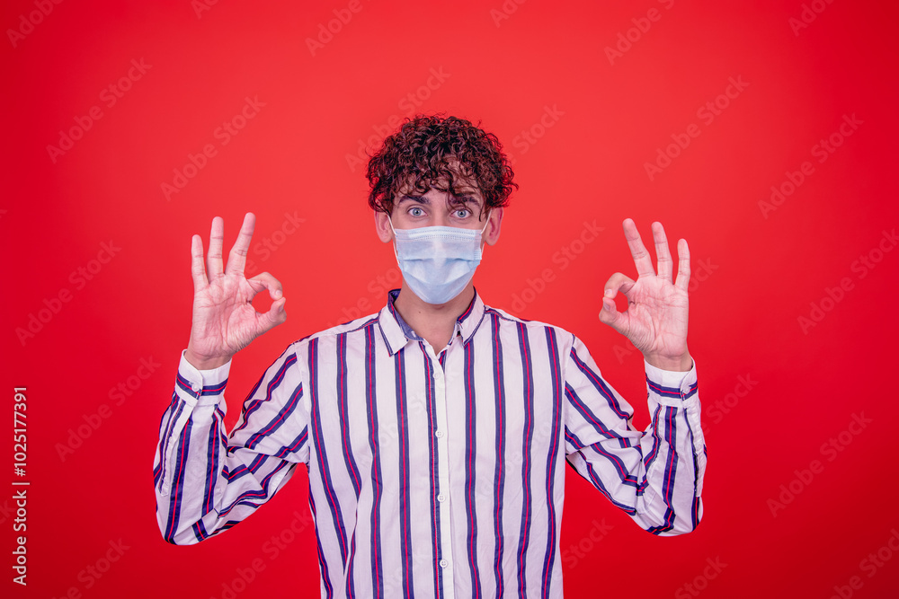 Young attractive guy and cold. Red background. Young attractive guy and cold. Red background.