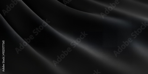 Close-up of a smooth black fabric.