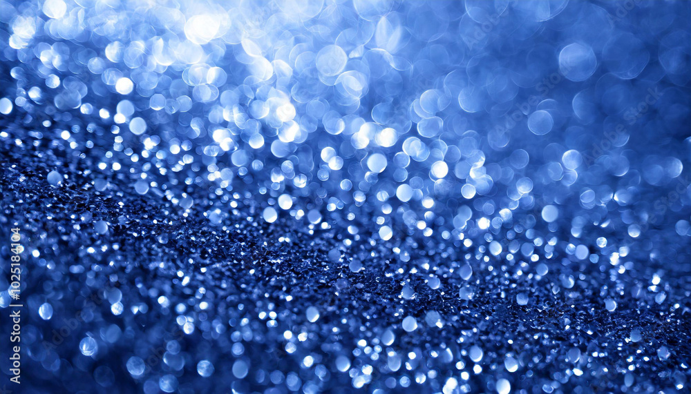 Sparkling blue bokeh texture with shimmering light reflections captured in a dark environment at night Sparkling blue bokeh texture with shimmering light reflections captured in a dark environment at night