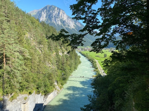 The Aare River in the Haslital Alpine Valley and in the Bernese Highlands - Meiringen, Switzerland (Die Aare Fluss im Alpental Haslital und im Berner Oberland - Meiringen, Schweiz) photo