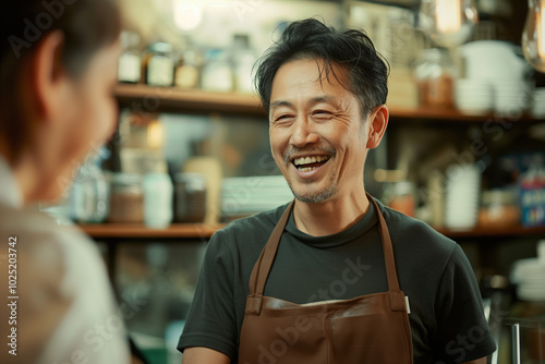 Shop owner warmly greeting customer with a smile