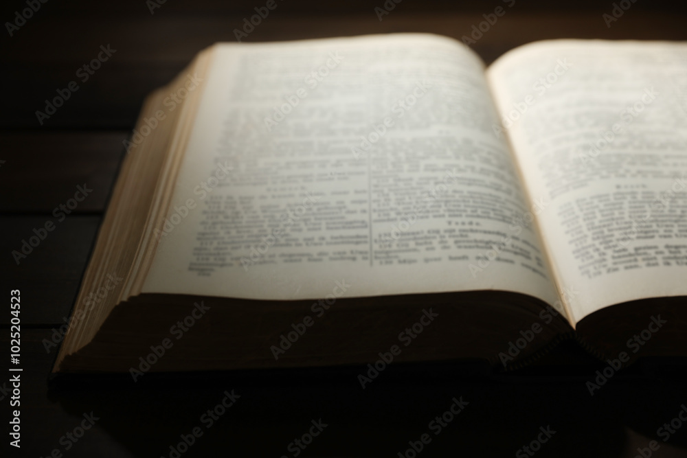 Open Bible on wooden table, closeup. Christian faith Open Bible on wooden table, closeup. Christian faith