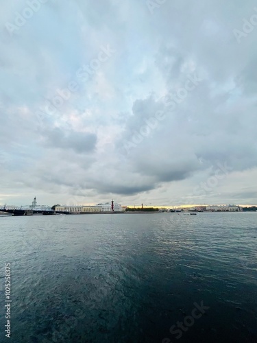 cloudy river view, wide city river, cloudy melancholic weather 