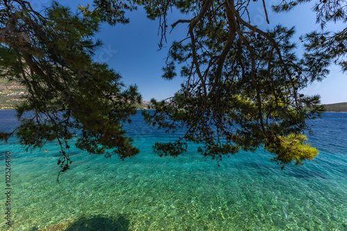 Trpanj, Peljesac peninsula, Adriatic Sea, azure water, rocky beaches photo