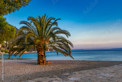 Fototapeta Naklejka Na Ścianę i Meble -  Trpanj, city beach, main beach in the morning