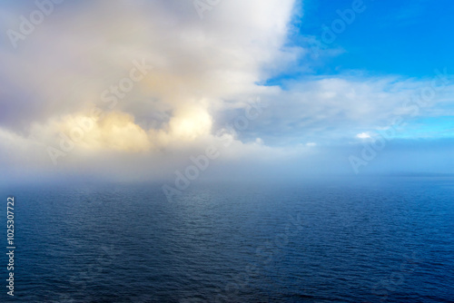 Wallpaper Mural Ocean weather change from blue sky to low clouds and foggy conditions Torontodigital.ca