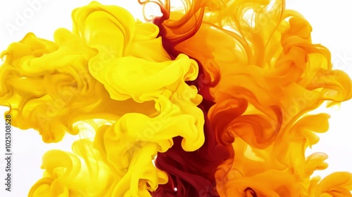 Bright splashes of yellow and red paint swirl in water, creating a mesmerizing abstract image. Vibrant colors blend in dynamic fluid motion, perfect for creative backgrounds.