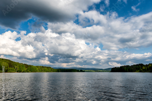 Vlasina lake beautiful summer scenery with beautiful clouds in the blue sky. Beautiful semi-artificial lake in Southeast Serbia photo