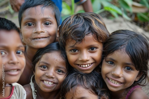 Group of indian children smiling at the camera in the village.