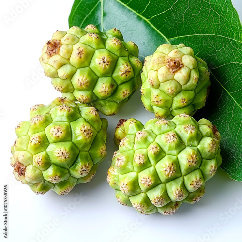 Wallpaper Mural Four green noni fruits with a leaf on a white background. Torontodigital.ca