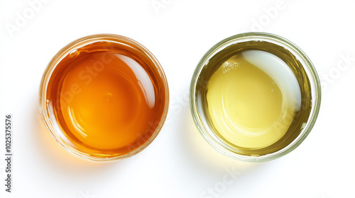 black tea or green tea: a close-up, top-down view of black tea and green tea in rounded puddle shapes, placed side by side with a small gap on a clean white background