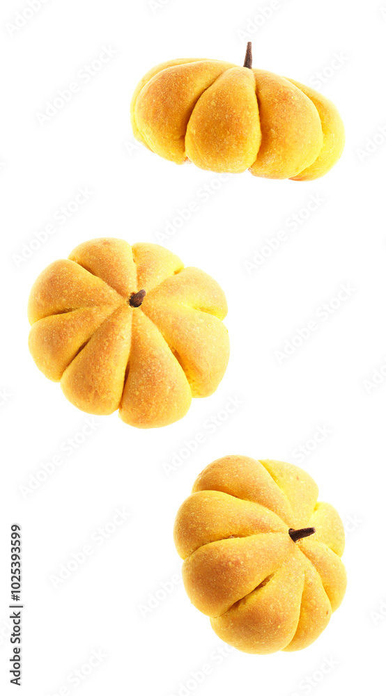 Pumpkin shaped buns in air on white background Pumpkin shaped buns in air on white background
