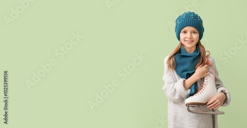 Cute little girl holding ic...