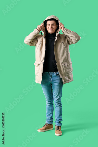 Young man in winter clothes...