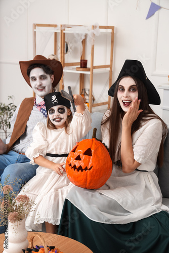 Happy family celebrating Ha...