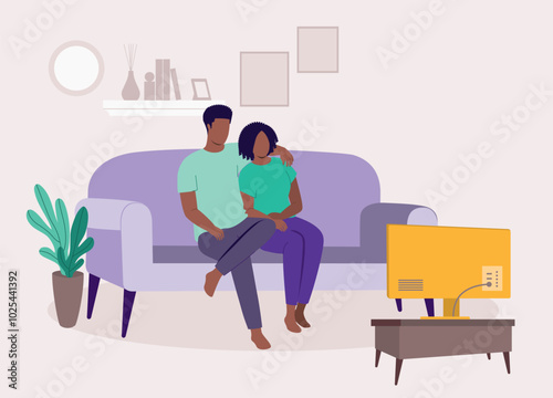 Black Couple Sitting On Sofa Side By Side With Arm Around Watching TV Together In The Living Room At Home.