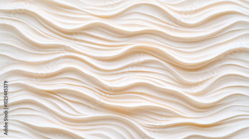 A captivating abstract image featuring soft, creamy waves undulating across the surface. 