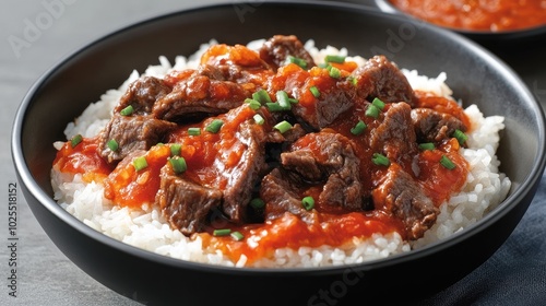 Savory Beef Dish Over Steamed Rice