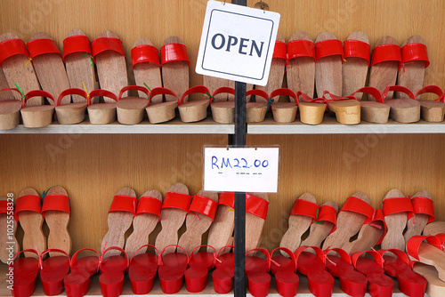 Cha Kiak, wooden clogs, Chinese traditional shoe for sale in Petaling Street Market, the centre of Kuala Lumpur’s original Chinatown.  photo