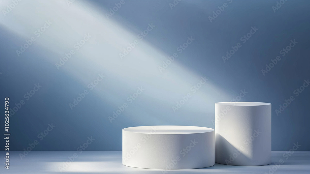Obraz premium Minimalist White Pedestals with Soft Natural Lighting on Blue Background.