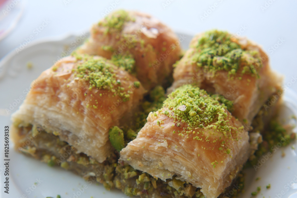 Enjoy the mouthwatering and delicious Baklava Slices that come with a delightful Pistachio Topping Enjoy the mouthwatering and delicious Baklava Slices that come with a delightful Pistachio Topping