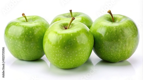 Close-up of four fresh green apples on white background