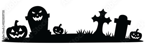 Black silhouettes of pumpkins on the cemetery 