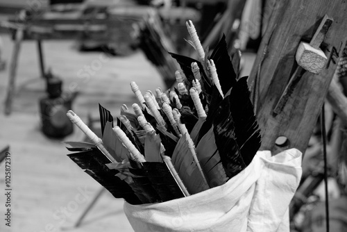Arrow fletching in a basket of arrows