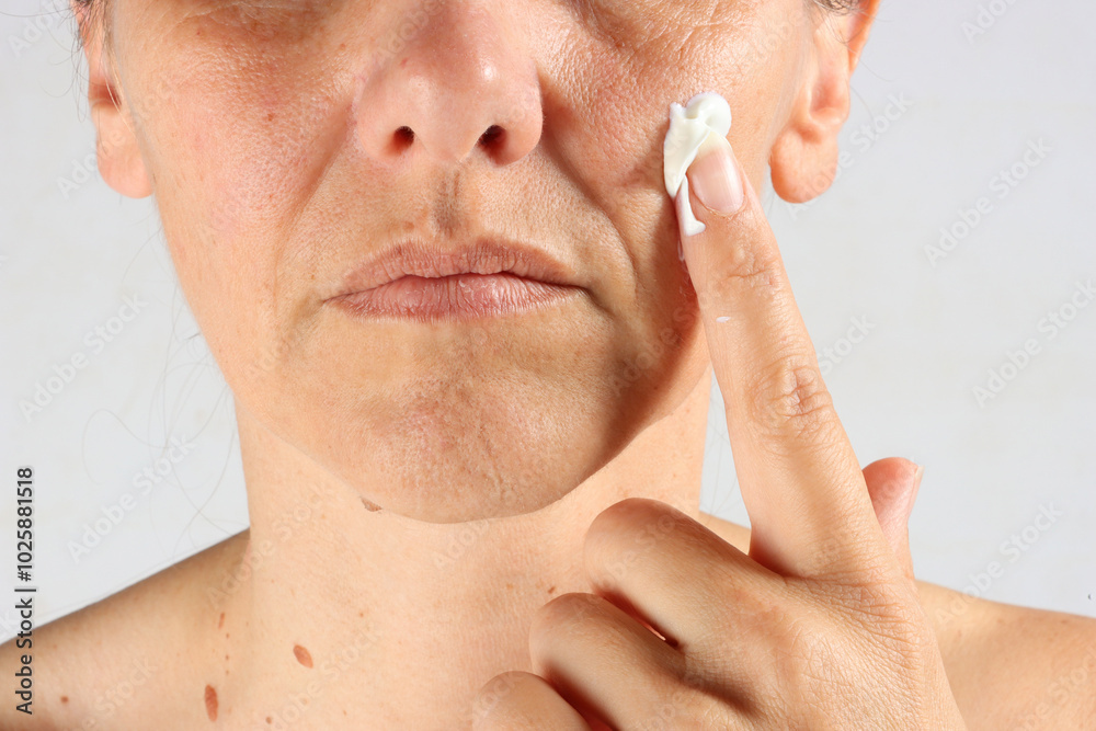 Fototapeta premium close-up on the wrinkles around the mouth of a 45-year-old woman , nasolabial folds