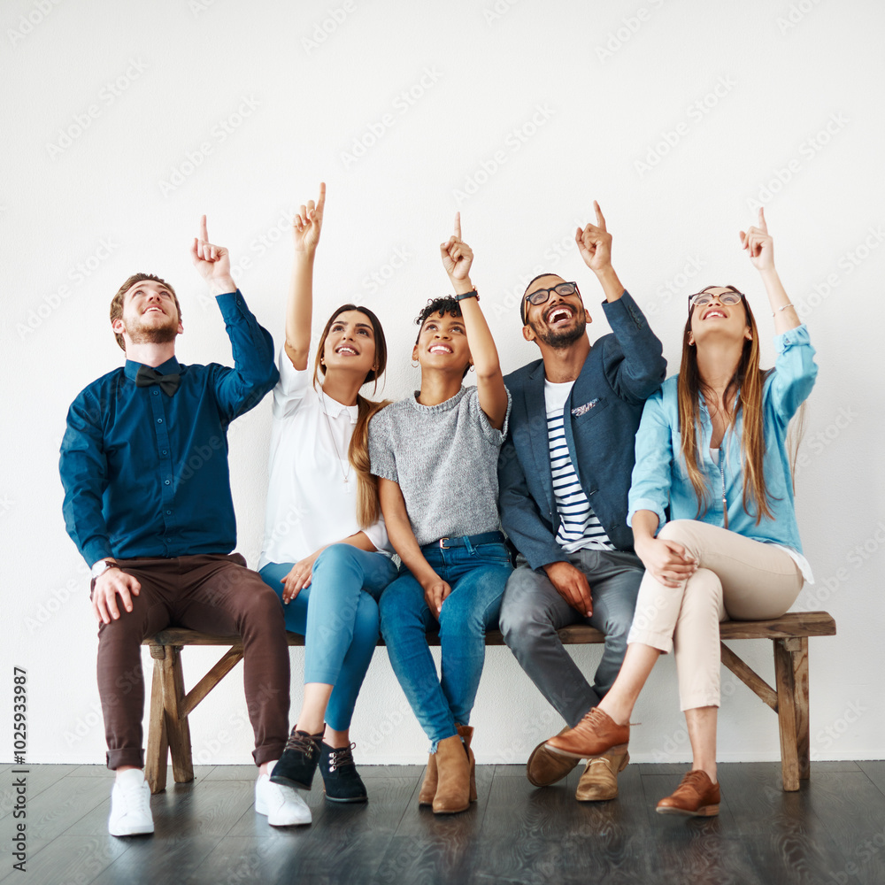 Business people, diversity and group pointing up for mockup, wall and space with opportunity. Creative employees, teamwork and smile with hand gesture, collaboration and decision for choice approval Business people, diversity and group pointing up for mockup, wall and space with opportunity. Creative employees, teamwork and smile with hand gesture, collaboration and decision for choice approval