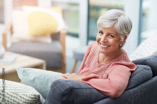 Portrait, home and senior woman on couch, relax and calm with retirement in living room. Face, pensioner and elderly lady with break, comfortable and resting with peace, happiness and chilling