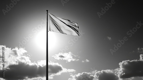 Serene sky canvas, a single flag's majestic dance with the wind majestic photo