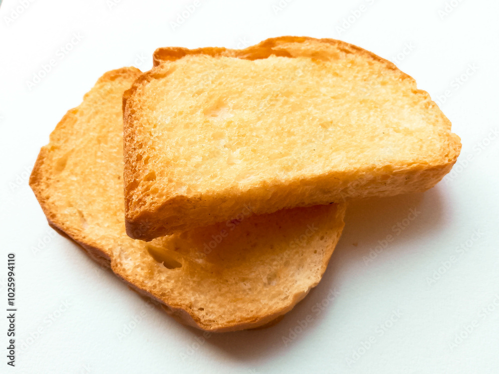 Crunchy Rusks or toasts isolated on white background Crunchy Rusks or toasts isolated on white background