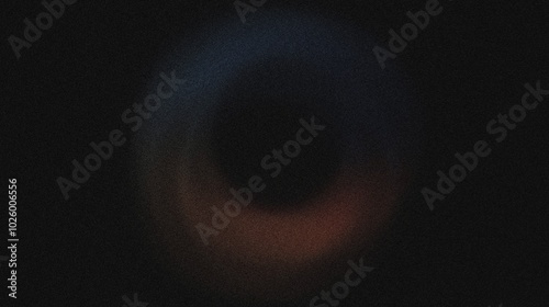 A gradient circle in the center of the image, blending from steel blue to burnt orange, noise texture effect