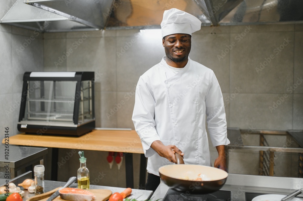 handsome african american chef at restaurant kitchen handsome african american chef at restaurant kitchen