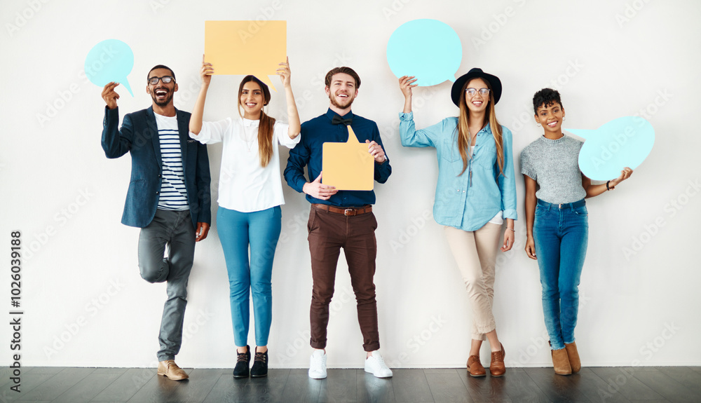 Fototapeta premium Happy, portrait and business people with speech bubble on wall for social media or review on a white background. Young, group or employees with smile, sign or shape for comment, feedback or mockup