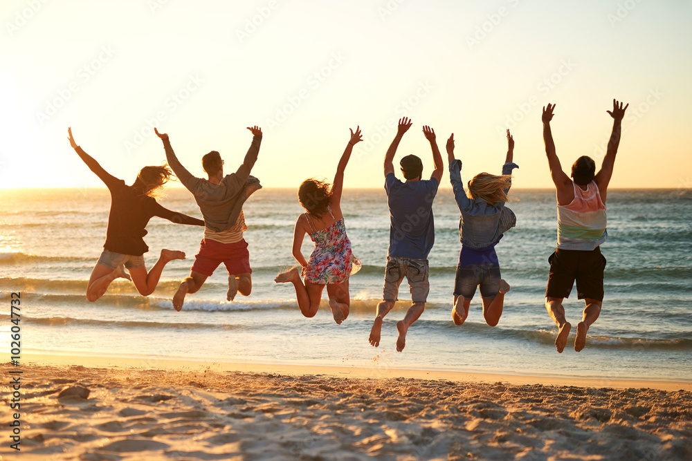 Fototapeta premium Back, beach and people with energy, jump and bonding together with journey, adventure and travel. Getaway trip, summer holiday and men with women, ocean and seaside with leap, Bali and waves with joy