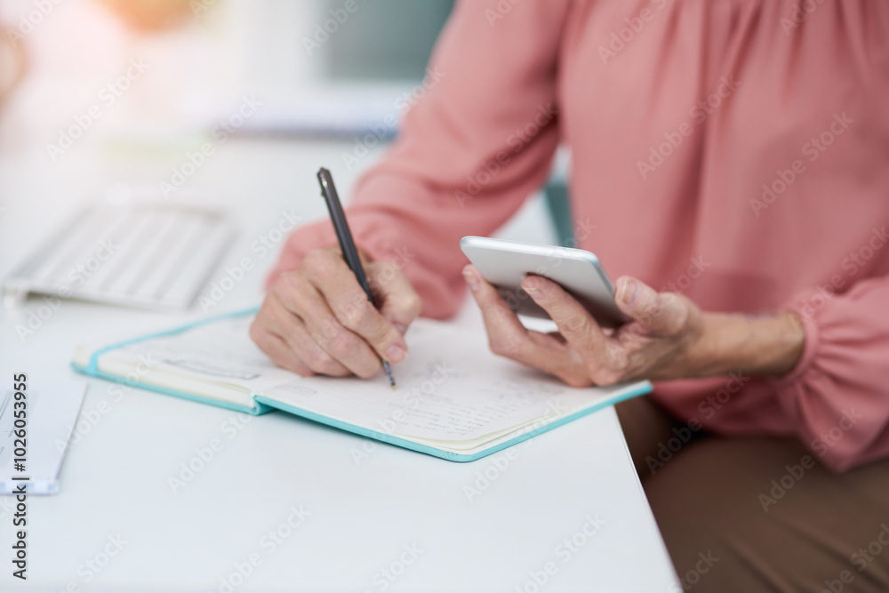 Woman, hands or writing with phone for planning, schedule or calendar update in business office. Mature assistant, mobile or book at desk for appointment management, company research or communication Woman, hands or writing with phone for planning, schedule or calendar update in business office. Mature assistant, mobile or book at desk for appointment management, company research or communication