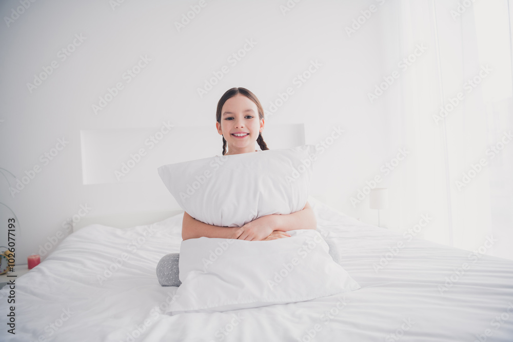 Portrait of cute adorable homey girl sitting enjoying weekend morning cozy apartment white light bedroom interior indoors Portrait of cute adorable homey girl sitting enjoying weekend morning cozy apartment white light bedroom interior indoors