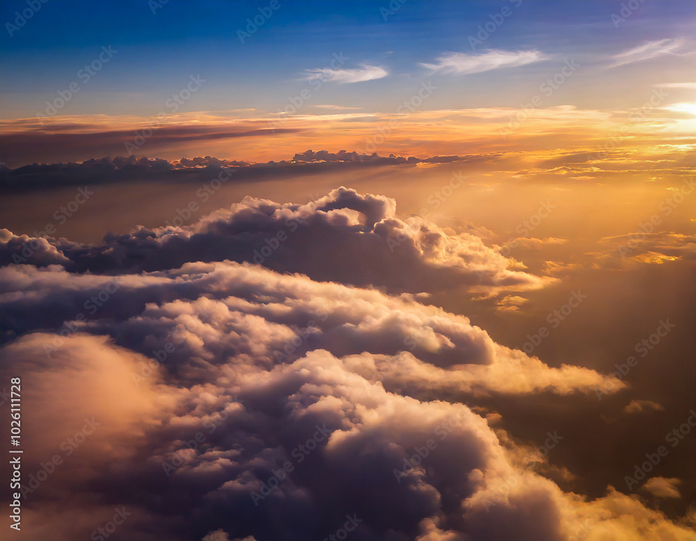 Breathtaking sunset view of clouds lit by vibrant orange hues from a high altitude perspective Breathtaking sunset view of clouds lit by vibrant orange hues from a high altitude perspective