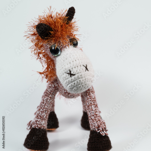 Amigurumi doll horse background white isolated photo