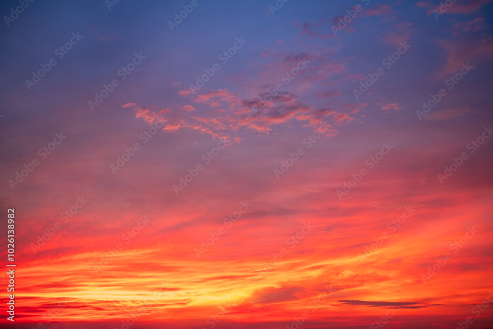 Obraz premium Beautiful , luxury soft gradient orange gold clouds and sunlight on the blue sky perfect for the background, take in everning,Twilight, Large size, high definition landscape photo
