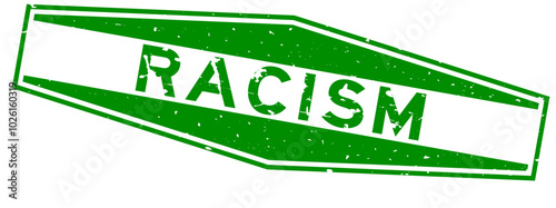 Grunge green racism word hexagon rubber seal stamp on white background