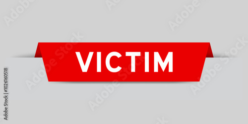 Red color inserted label with word victim on gray background