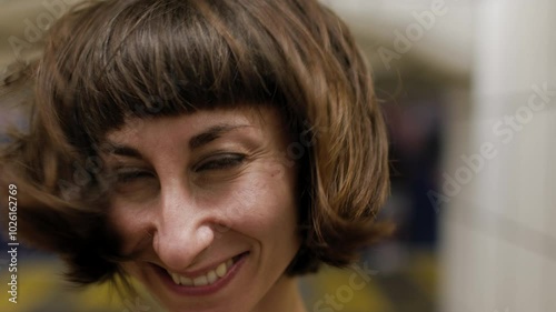 Wallpaper Mural Young girl laughing and having a good time. Close-up of young girl's face. Girl standing at metro station. Torontodigital.ca