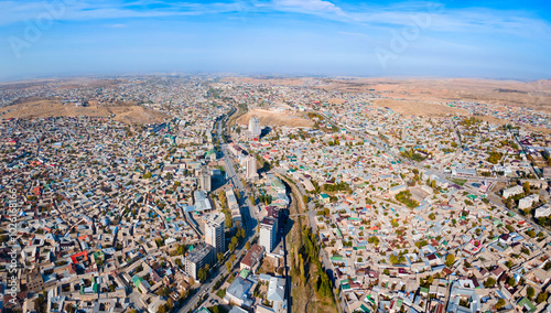 Istaravshan city aerial panoramic view in Tajikistan photo